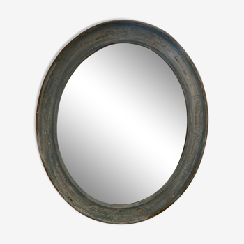 Miroir oval patiné