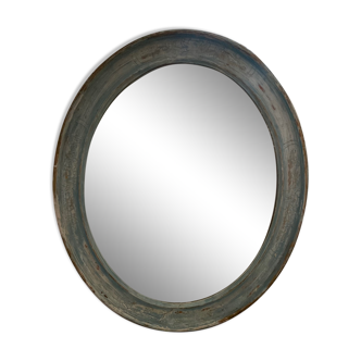Miroir oval patiné