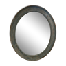 Patinated oval mirror