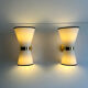 Pair of vintage wall lamps, brass and unbleached fabric, Italy 1980