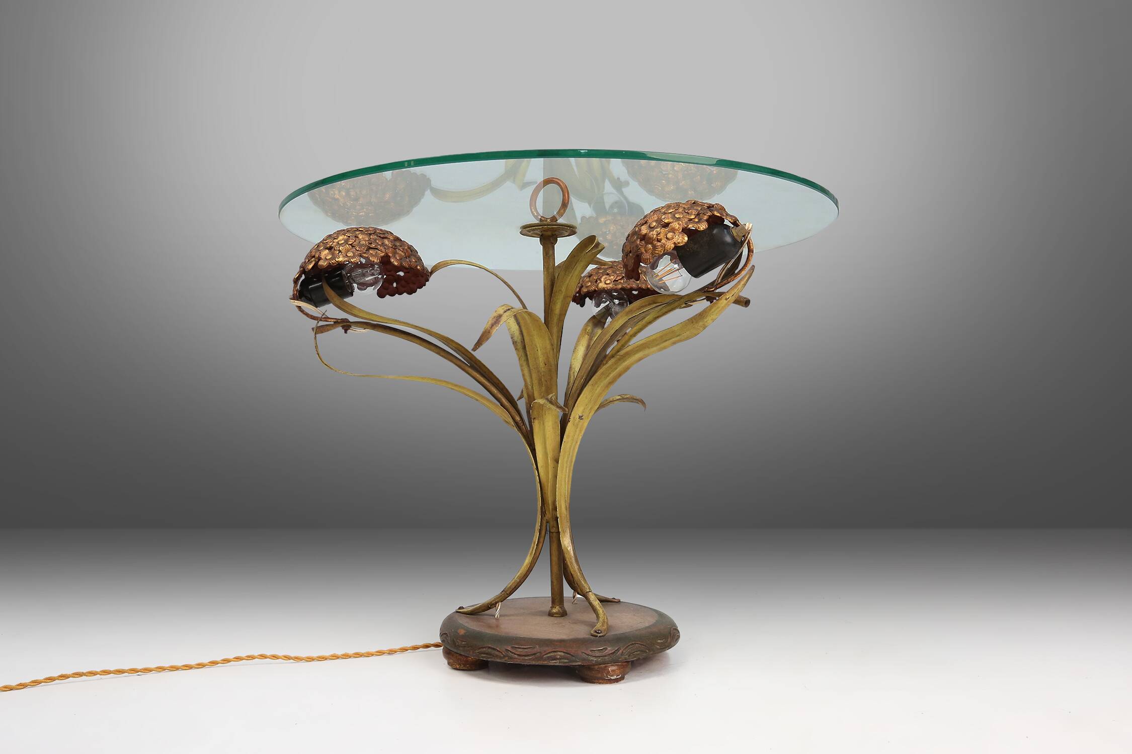 French Hollywood Regency style coffee table with lightning in brass flowers, 1950