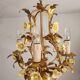 Vintage gilded hand-forged Florentine ceiling light with porcelain roses.