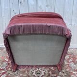 Fauteuil style crapaud en velours rose capitonné