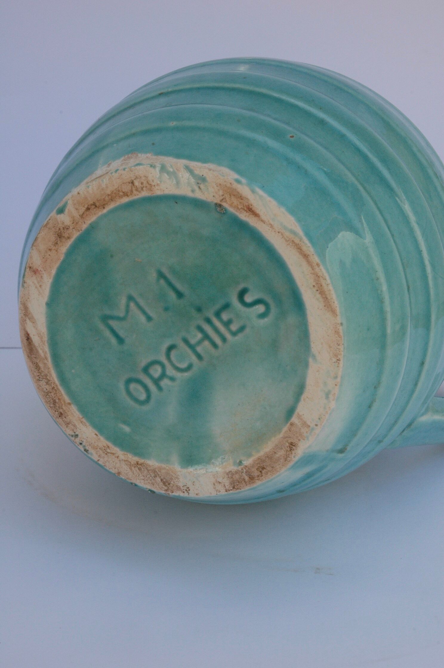 Blue-green pitcher in Orchies earthenware