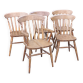 Set of 4 chairs and 1 armchair in mountain style made of oak.