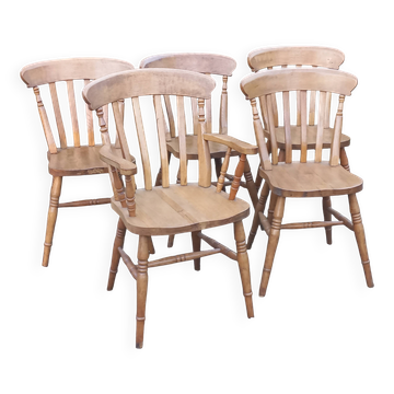 Set of 4 chairs and 1 armchair in mountain style made of oak.