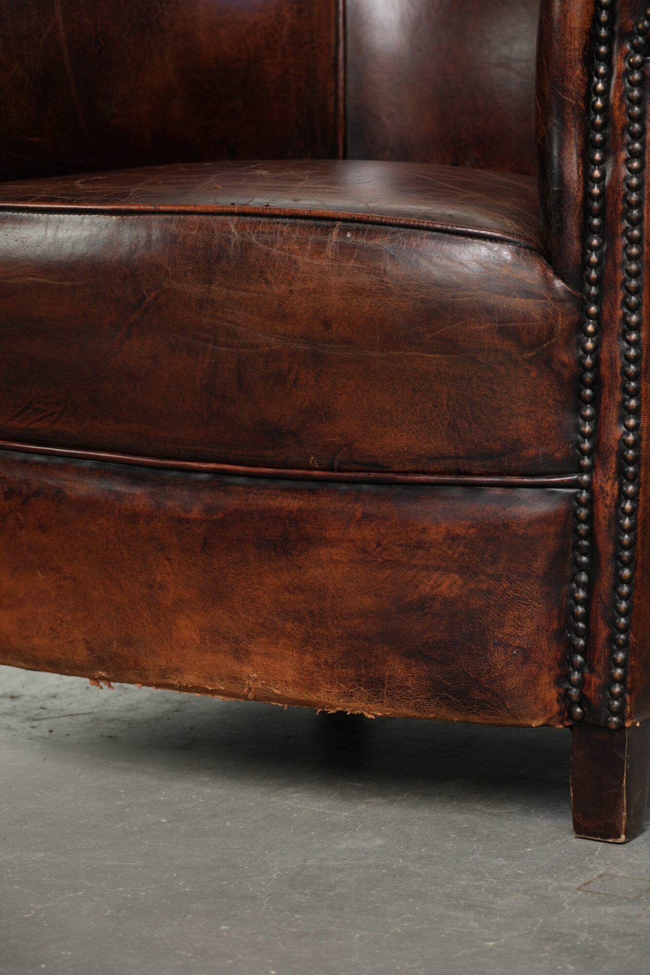 Vintage sheepskin club armchair with beautiful colours and a subtle size