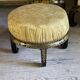 A set of two armchairs, a sofa and two poufs in lacquered wood with gilded chinoiserie decoration.