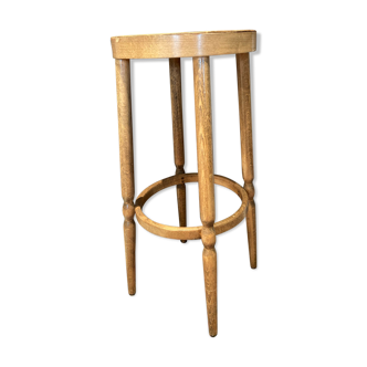 High curved wooden stool