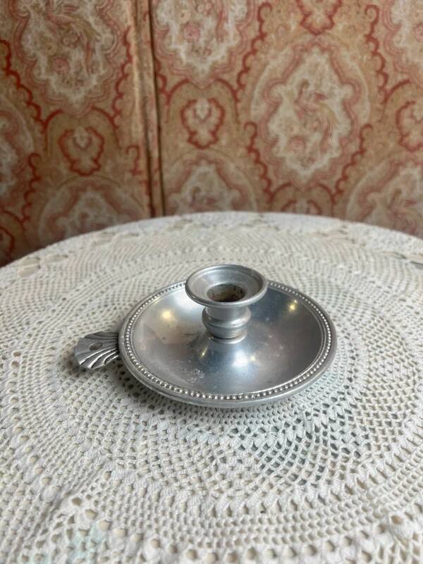 Silver aluminum hand candle holder