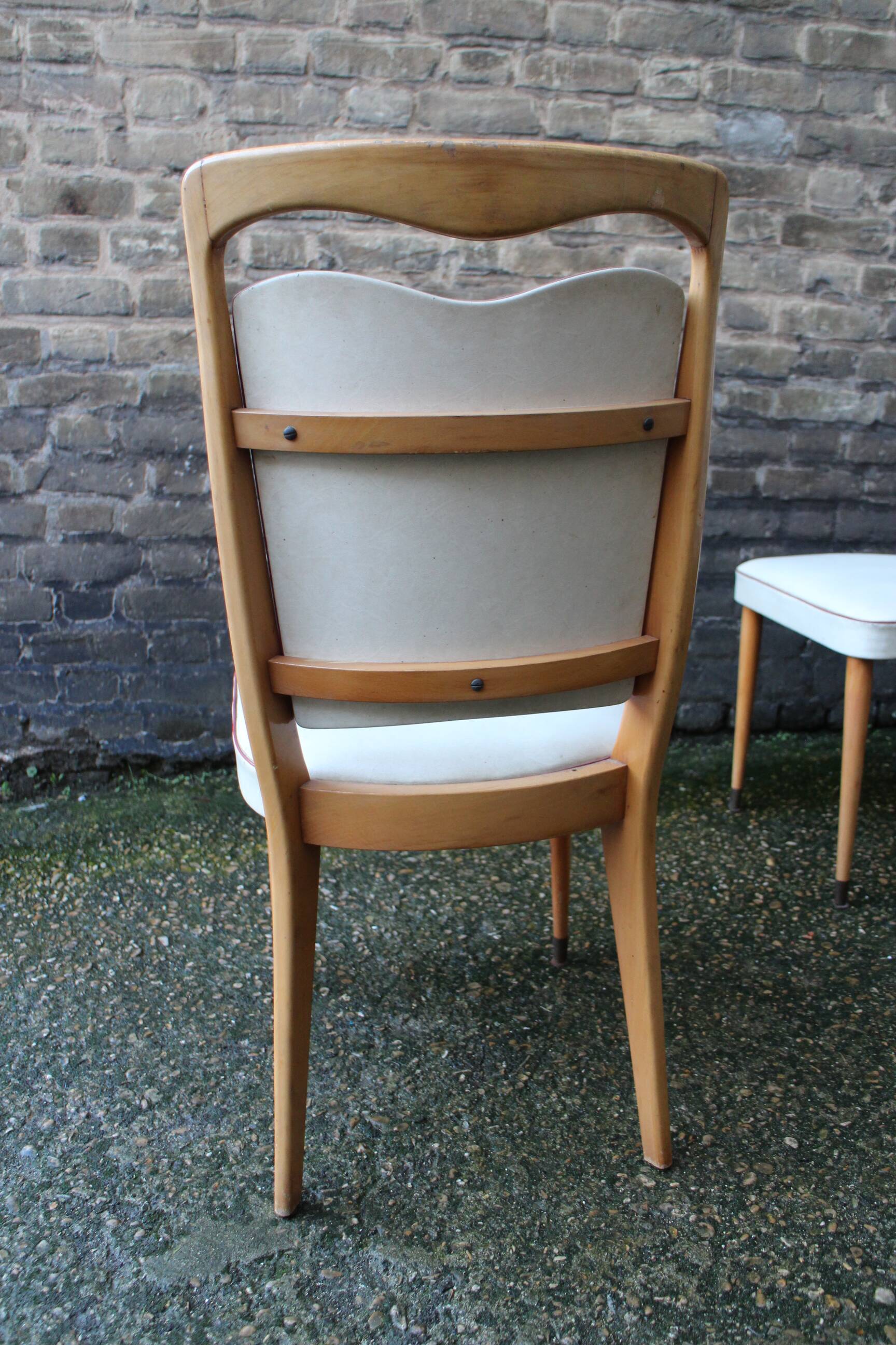 series of 8 vintage skai and wood chairs