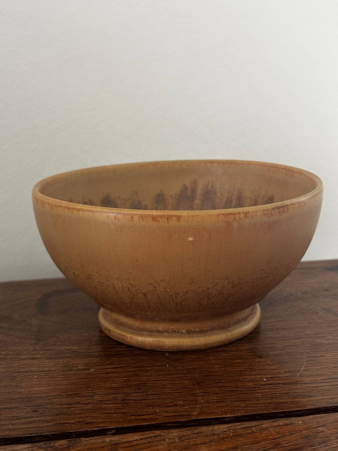 Vintage stoneware bowl on a vintage stand.