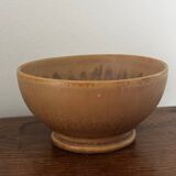 Vintage stoneware bowl on a vintage stand.