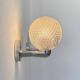 Pair of vintage wall lights in chrome metal and pressed moulded glass, France, 70s.