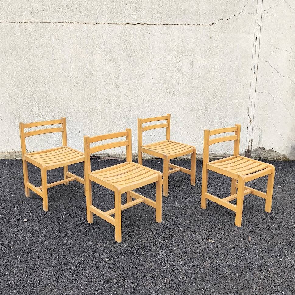 Set of 4 varnished wooden chairs, André Sornay