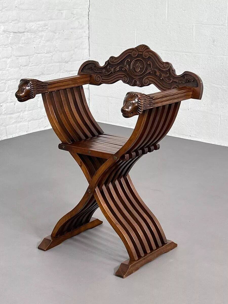 Vintage folding chair in carved wood