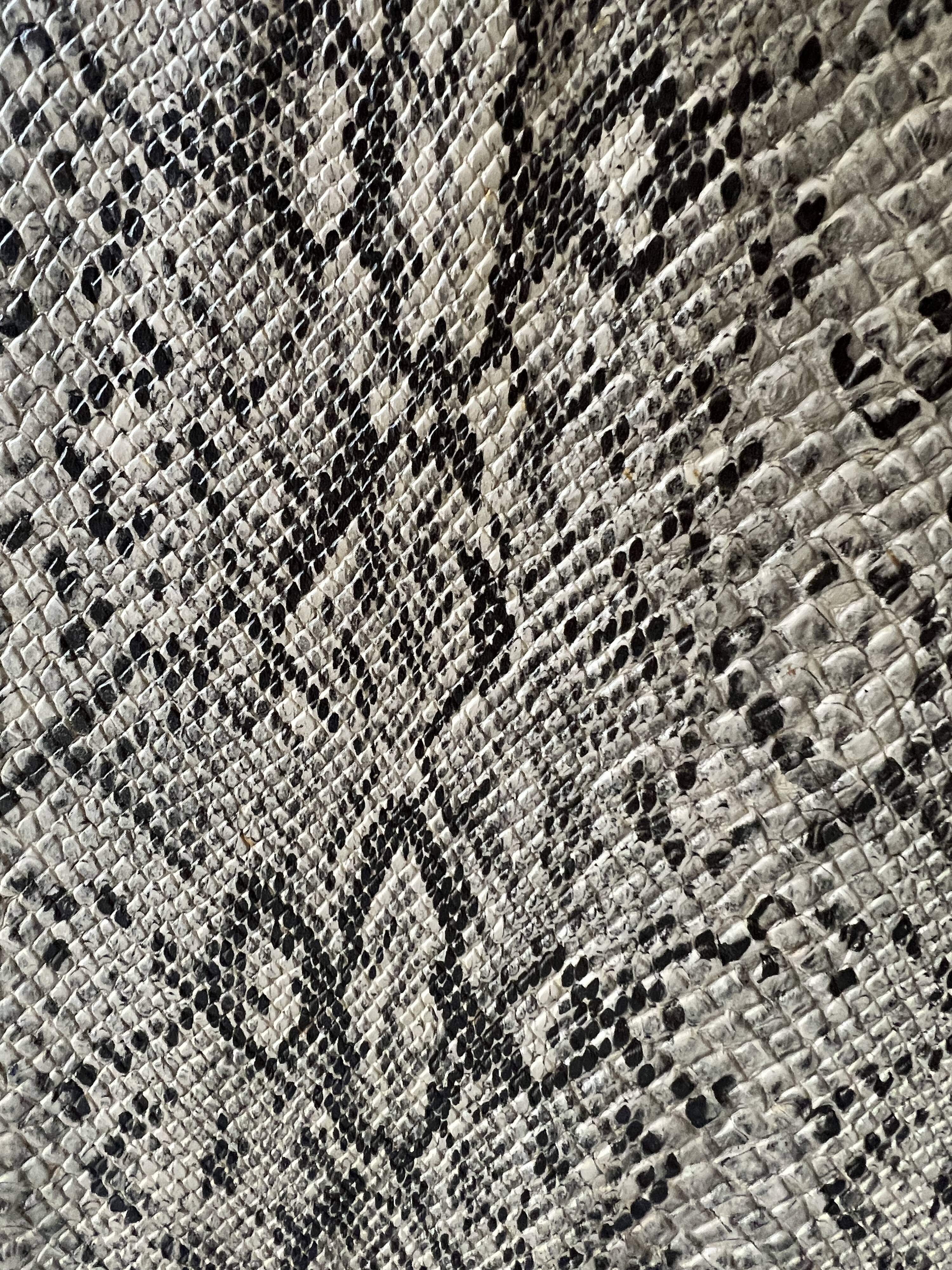 1970s design magazine rack in metal and python leather