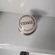 Set of a sink and its retro ceramic splashback.