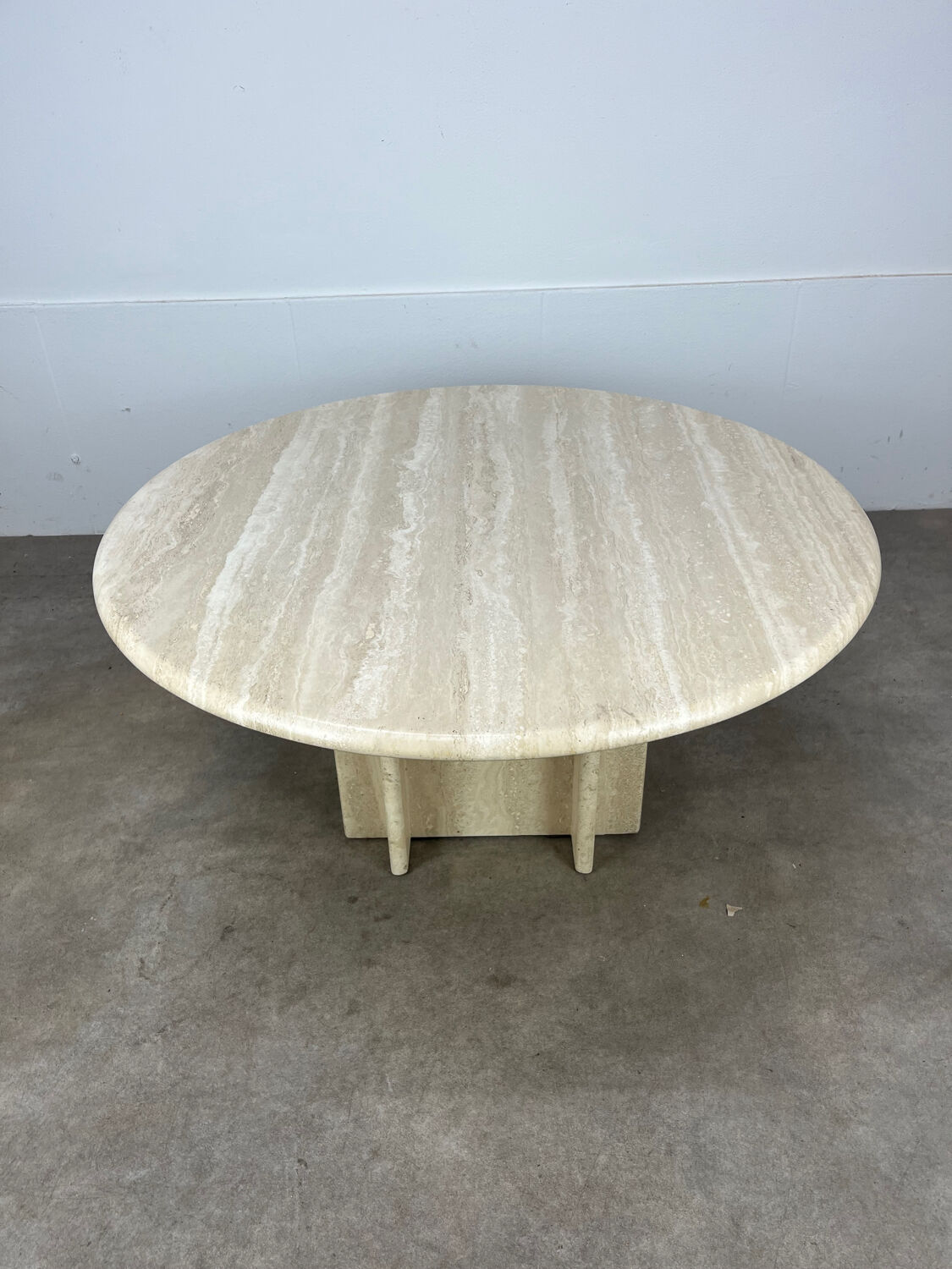 Round travertine coffee table