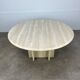 Round travertine coffee table