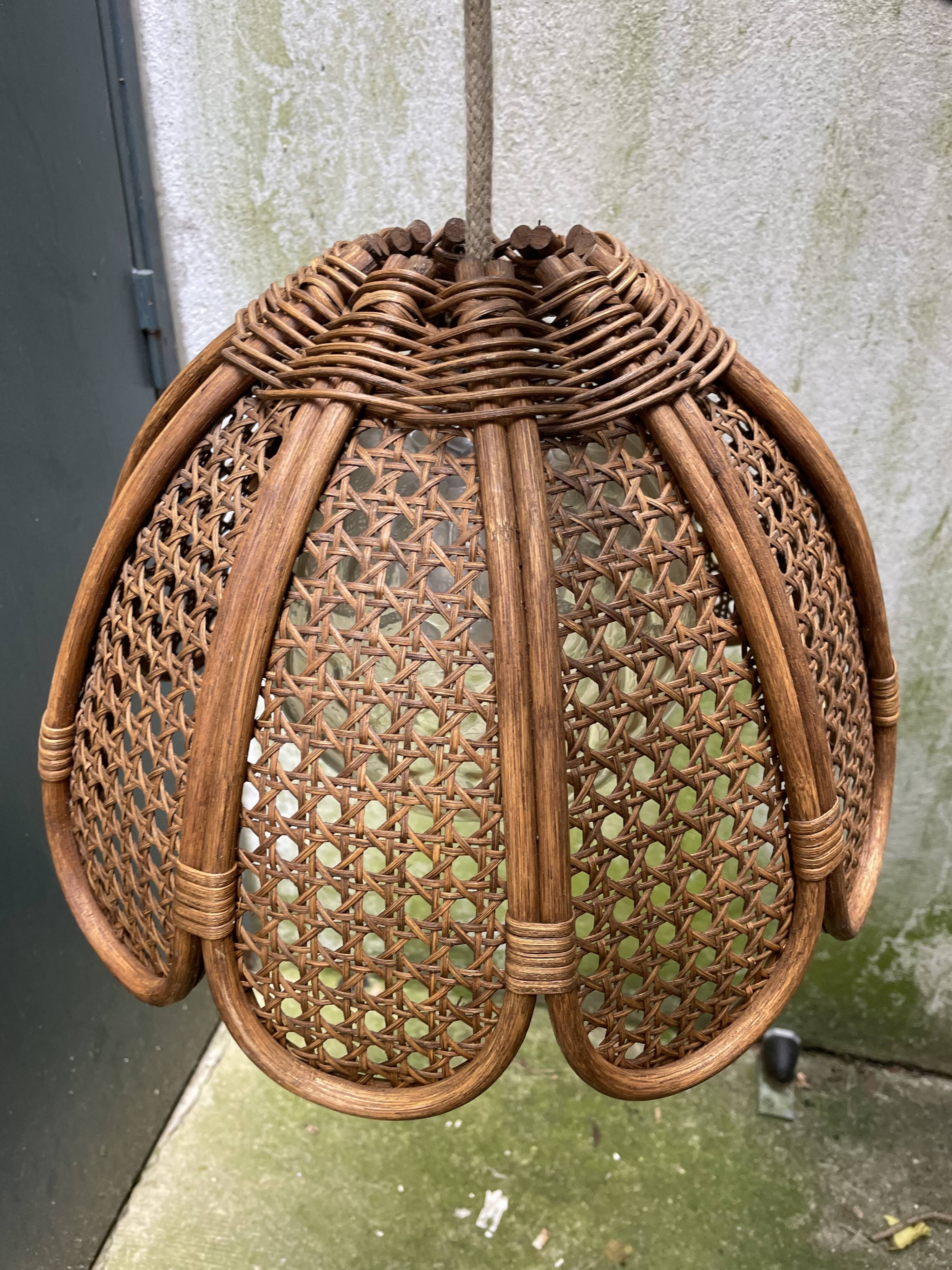 Duo of rattan and glass chandeliers