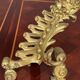 Massive gilded bronze fireplace decoration in Rococo style.