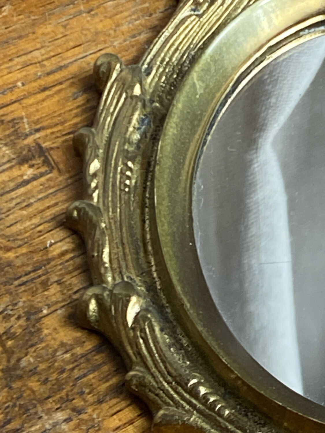 Small antique bronze mirror