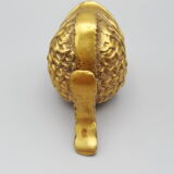 Old brass ashtray in the shape of a fish