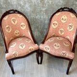 Pair of carved solid mahogany gondolas from the 19th century