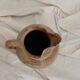 Old farm jug in glazed stoneware