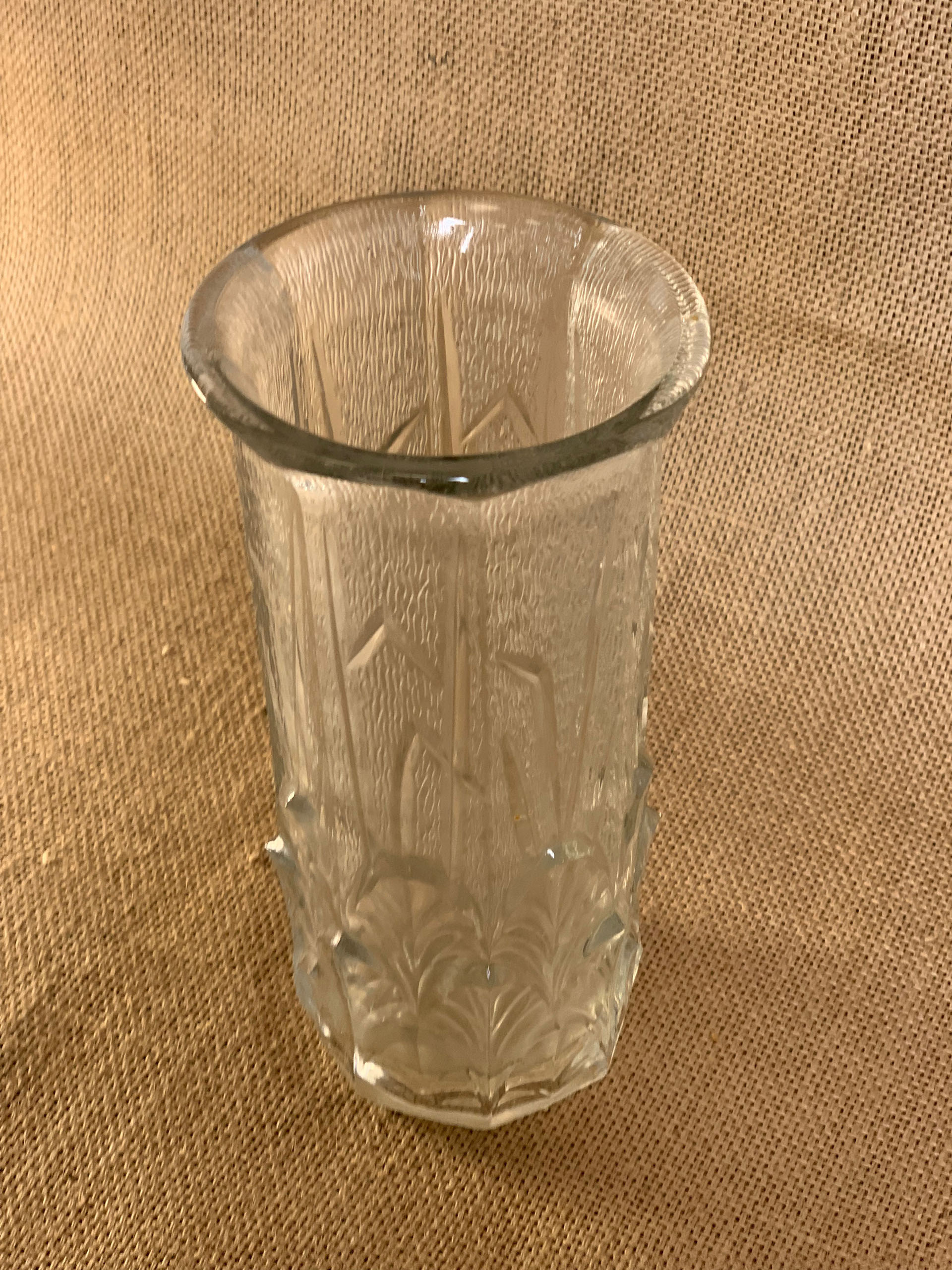 Old cylindrical vase in 40s style in thick glass