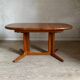 Vintage oval teak Scandinavian table with a central star base from Glostrup.