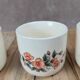 Set of 3 vintage ceramic cups with floral decoration.