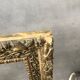 Old wooden frame and gilded stucco 50x60
