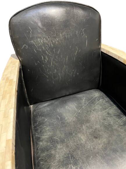 Pair of leather armchairs with marquetry armrests