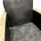 Pair of leather armchairs with marquetry armrests