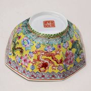 Vintage porcelain bowl decorated with dragons and flowers, China, 1980s.