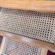 Vintage nesting tables in wood and cane – perfect condition.