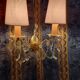 Pair of glass and brass wall lights with tassels, 1950s period