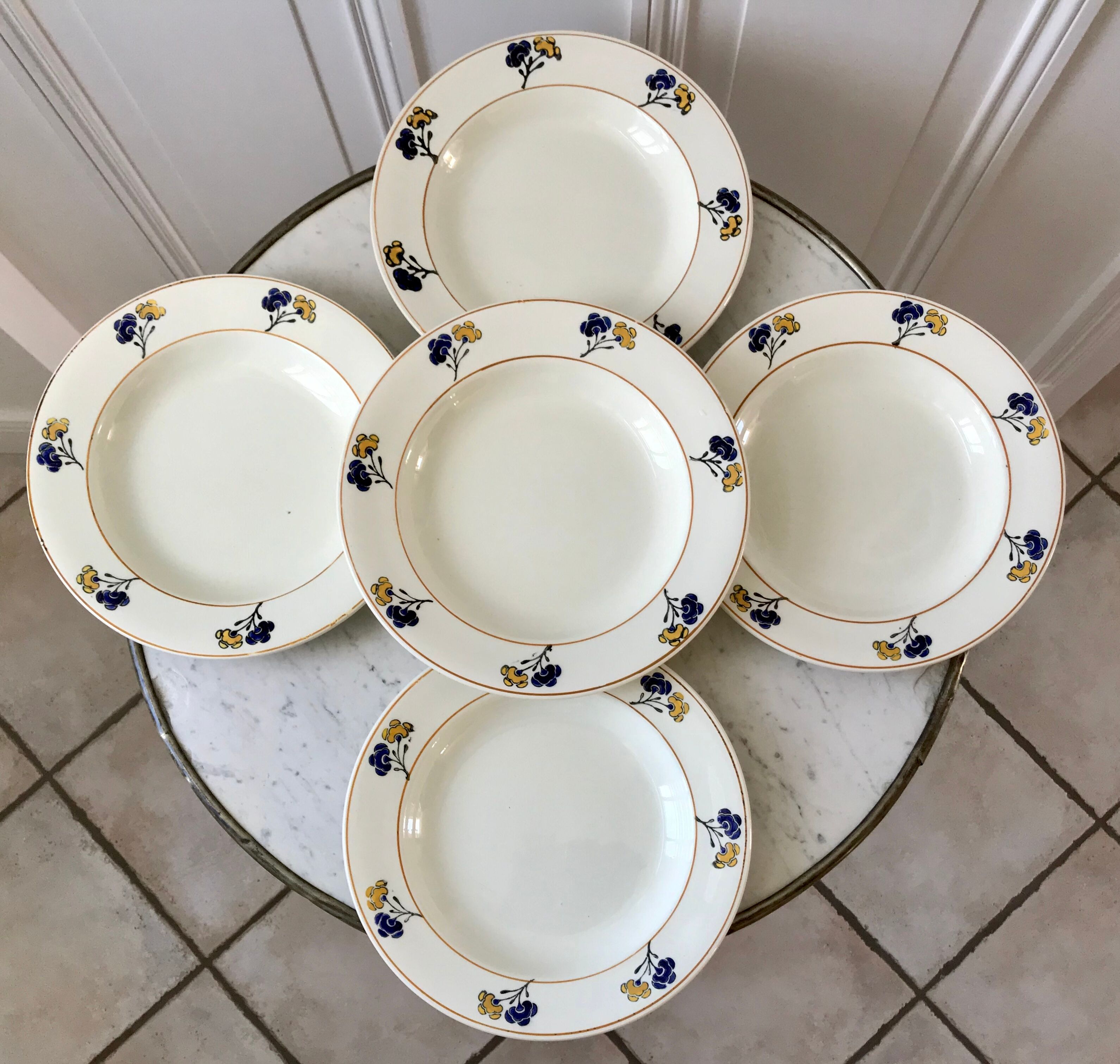 Set of 5 hollow plates Iron Earth model "Romeo" early XXth