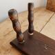 Vintage rectangular stool in dark wood with turned legs.