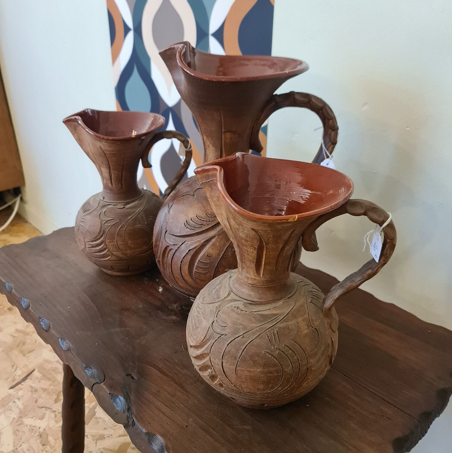 Set of carved terracotta pitchers