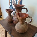 Set of carved terracotta pitchers