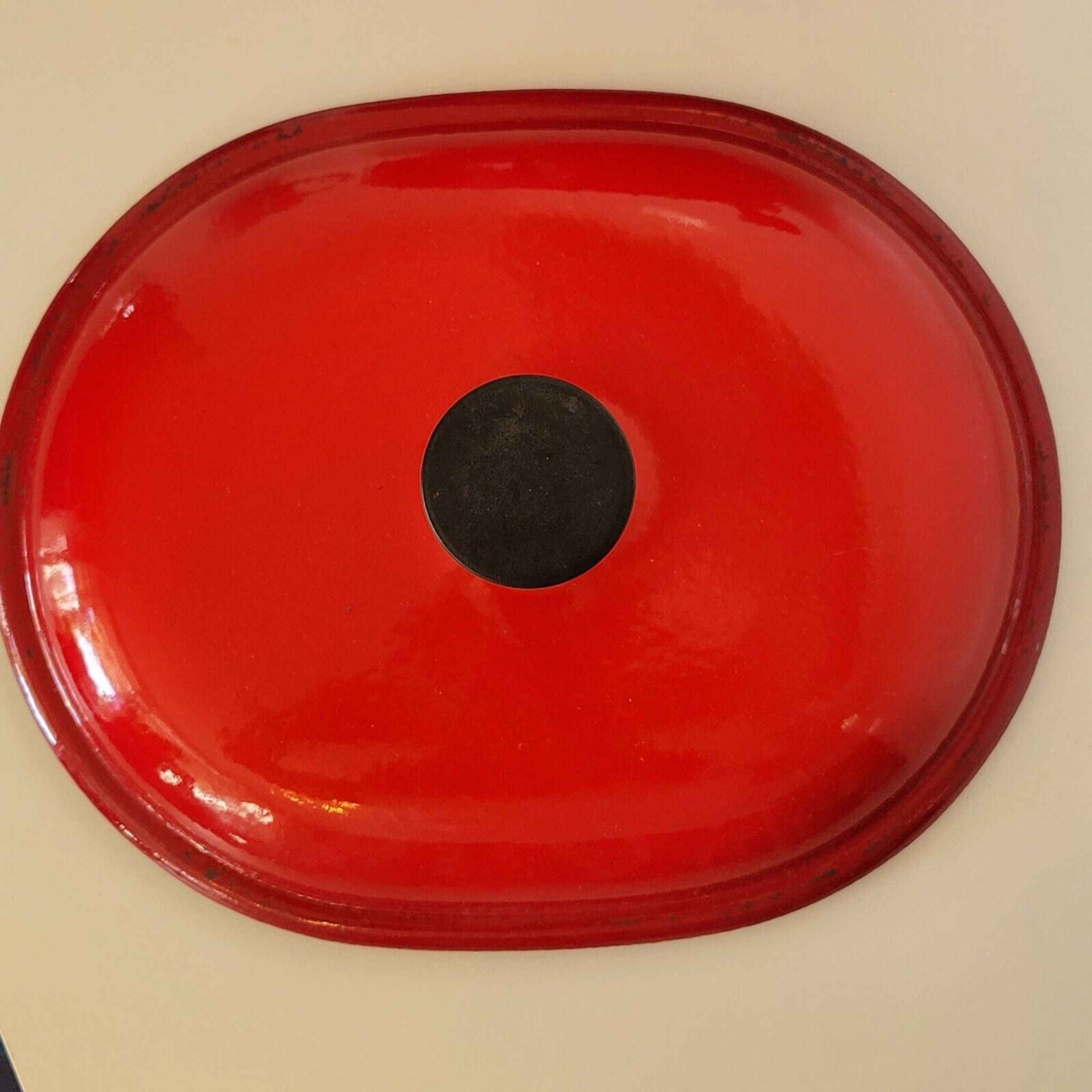 Oval casserole in red enamelled cast iron Enzo Mari La Mama 25