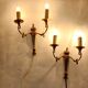 Pair of neoclassical sconces in bronze and gilded brass 1950.