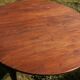 Round drop-leaf table in beech and pine