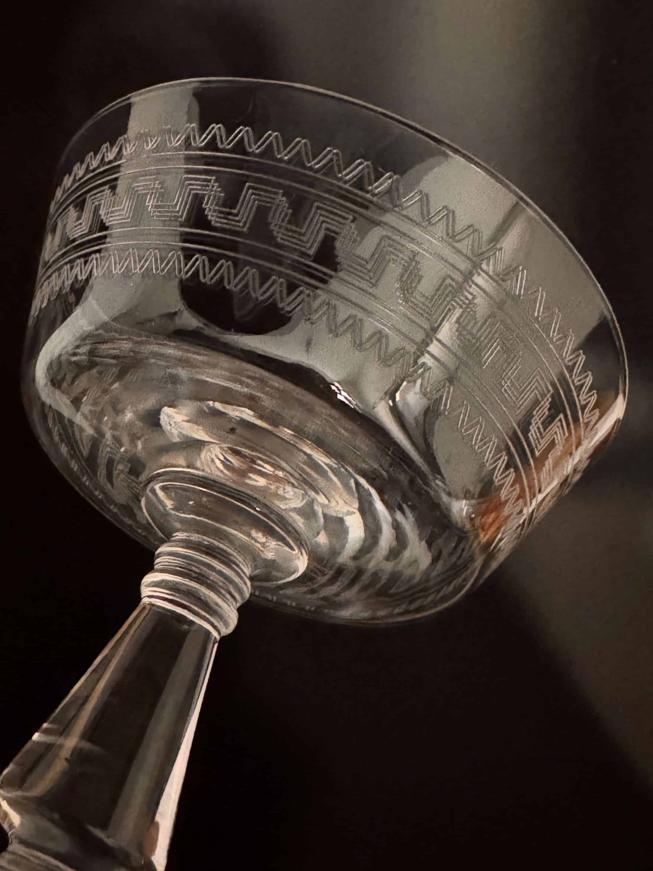 Baccarat, set of 10 engraved crystal champagne glasses from 1900.