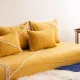 Set of yellow Moroccan floor sofa covers.