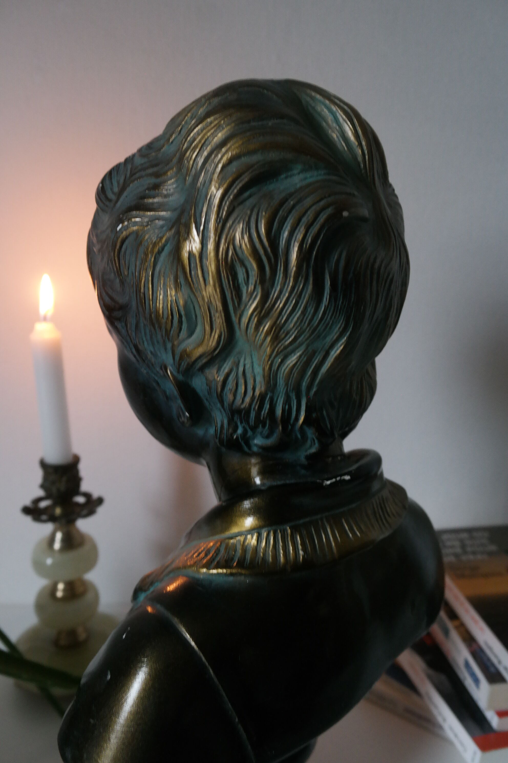 Buste en plâtre garçon patine bronze XXème
