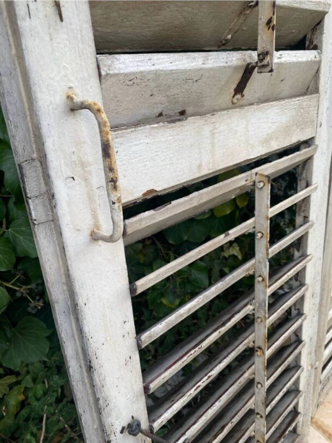 Old wooden shutter blinds